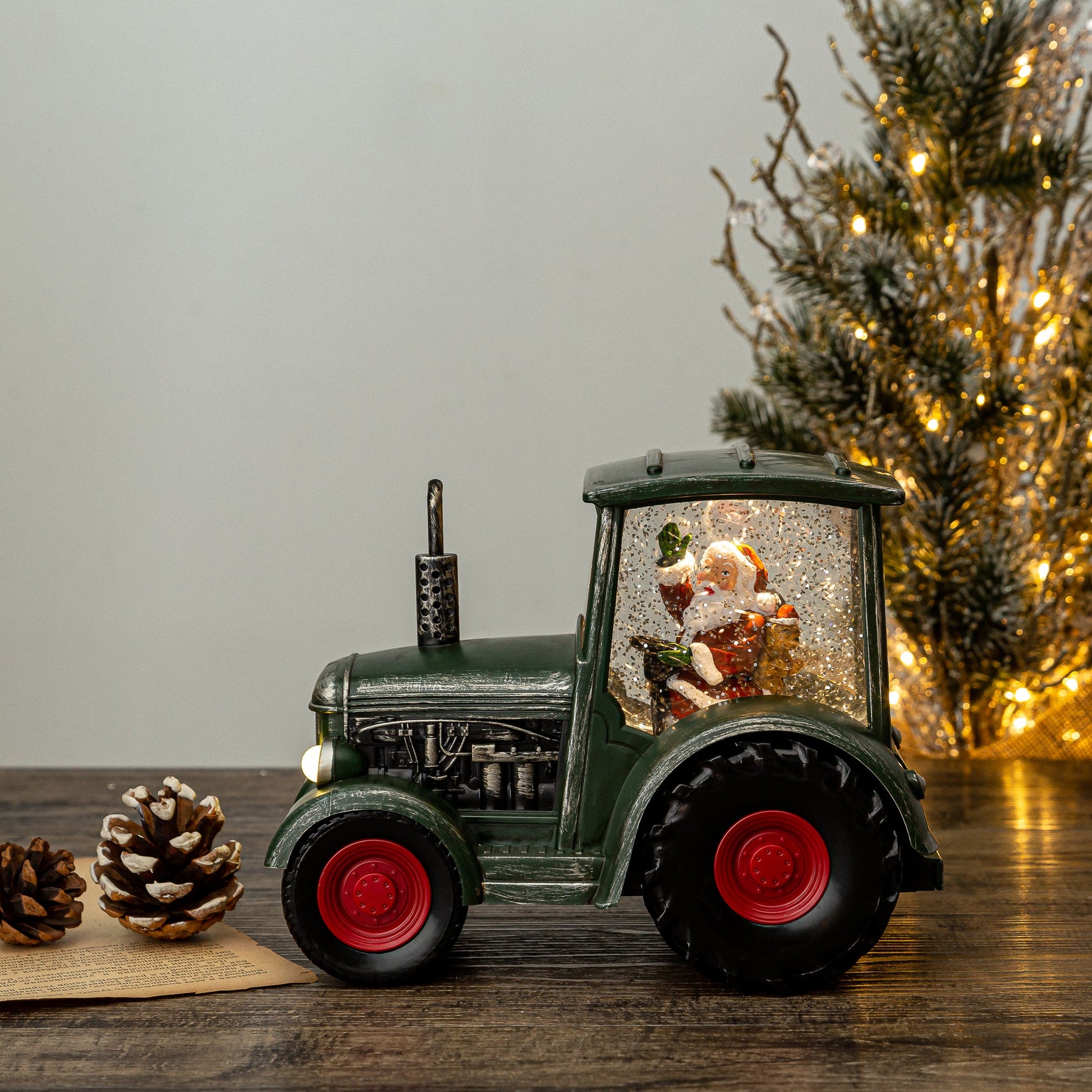 green tractor christmas snow globe