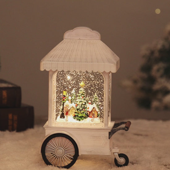 Nordic cart christmas snow globe village video