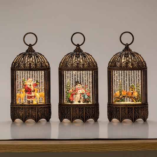 Bird cage Christmas snow globe