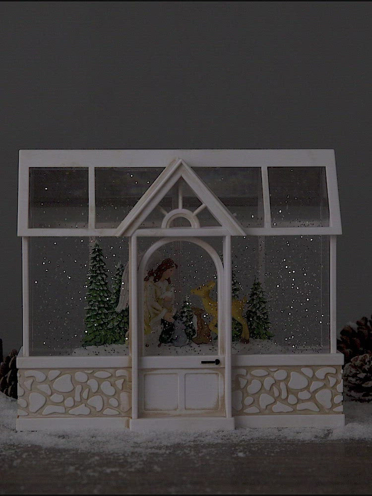 Green/glass house christmas snow globe angel video