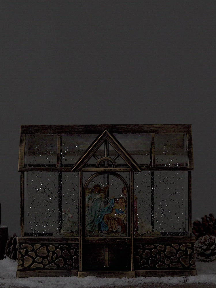 Green/glass house christmas snow globe nativity video