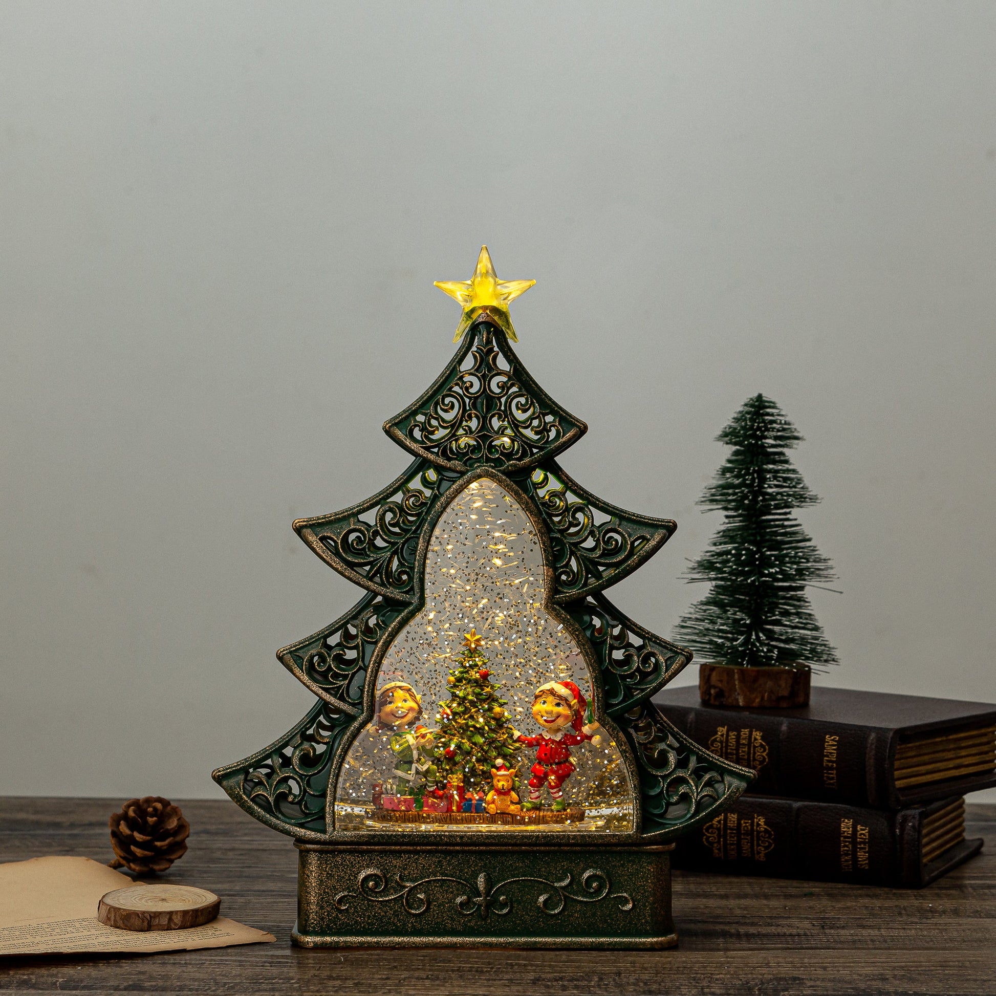 christmas tree snow globe with elves